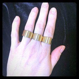 Gold tone multi finger statement ring